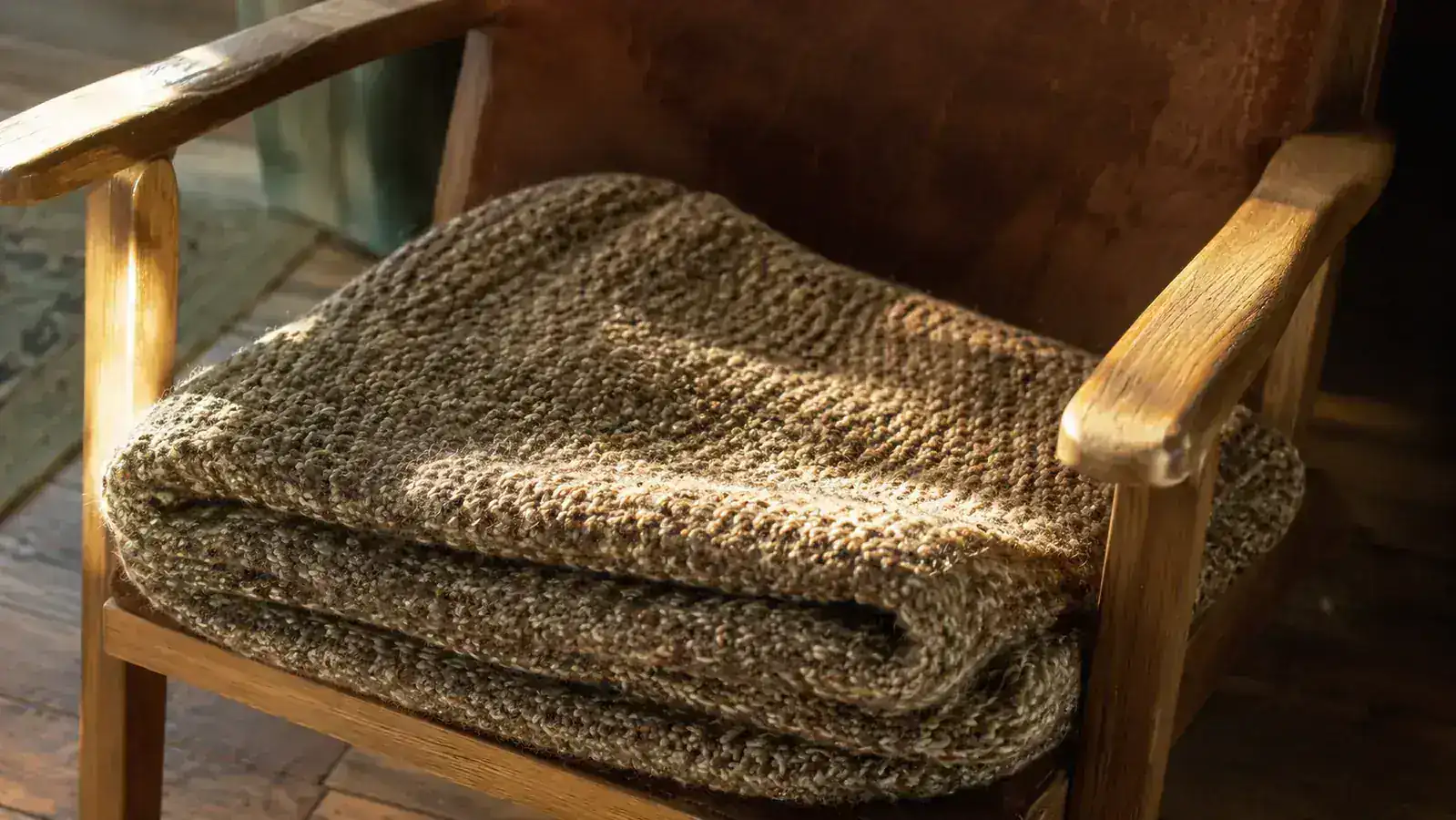 ChomChom Roller being used on a car seat covered in dog hair